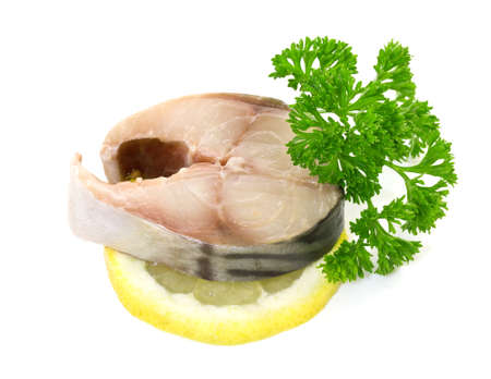 mackerel with lemon on a white background の写真素材
