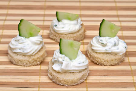 CanapÃ© with spicy cream cheese and cucumberの写真素材