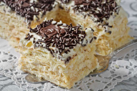 Cake from flaky pastry with whipped cream
