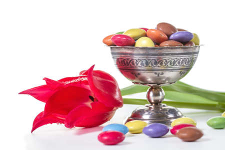Candy-colored background with red tulipsの写真素材
