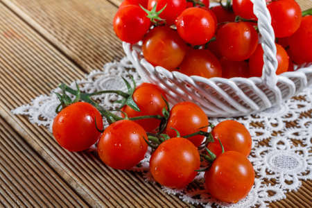 Fresh tomatoes on wooden backgroundの写真素材