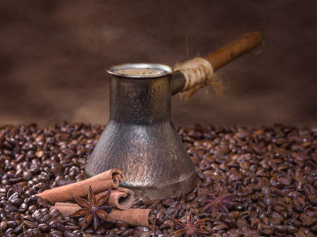 Freshly brewed coffee with cinnamon and aniseの写真素材