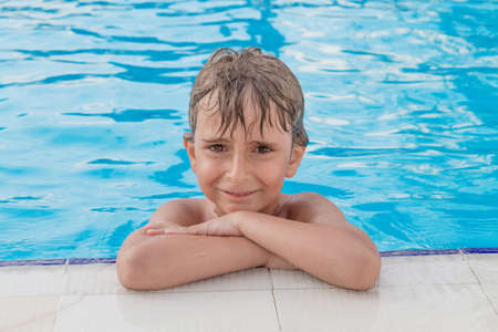 Portrait of the boy in the pool 