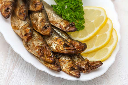 Smoked sardines with lemon and herbs 