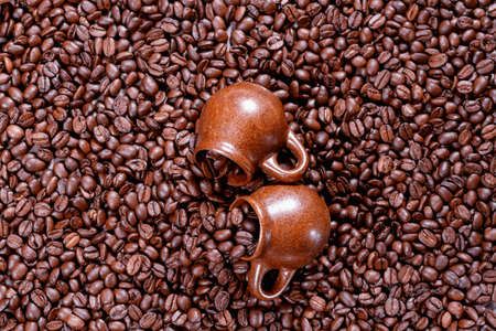 Background of coffee beans with cup の写真素材