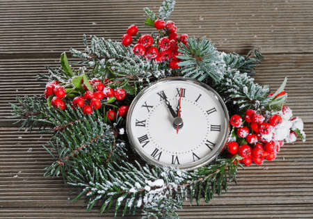 Christmas clock with winter decorationの写真素材
