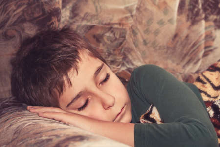 Sleeping child.  Toned image.の写真素材