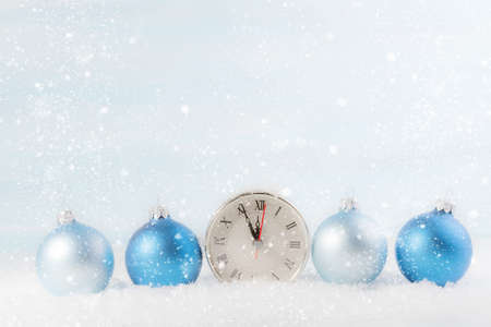 Christmas clock with Christmas balls. Shallow depth of field