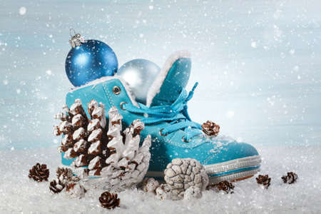 Christmas background with boots and Christmas decorationsの写真素材