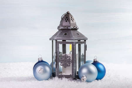 Christmas lantern with blue Christmas ballsの写真素材