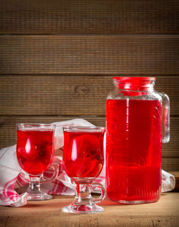 Jug and glasses with strawberry juiceの写真素材