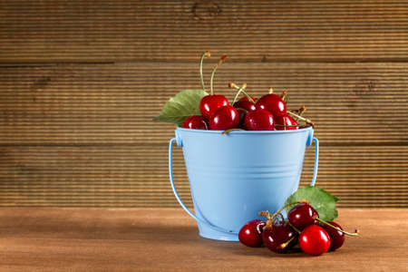 Fresh Sweet Cherries on the Table Boards