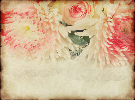 Vintage background with old paper and roseの写真素材