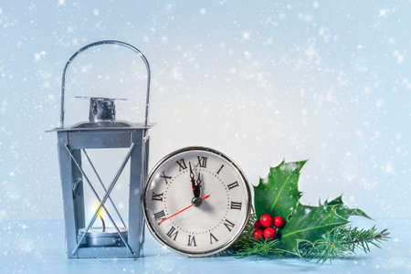 Christmas lantern with Holly leaves and berries  and  Christmas clock