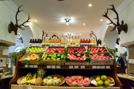 Munich, Germany - August 6, 2016: Showcase with fresh fruit in the Alois Dallmayr. Coffee and Food Store located near Marienplatz in Munich.のeditorial素材