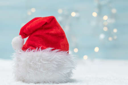 Holiday background with Santa Claus hatの写真素材