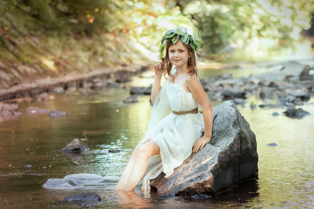 Portrait of a girl in the image of a forest nymphの写真素材