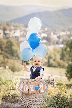 Boy's first birthday with balloonの写真素材