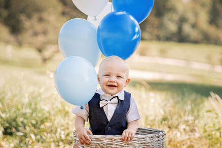 Boy's first birthday with balloonの写真素材
