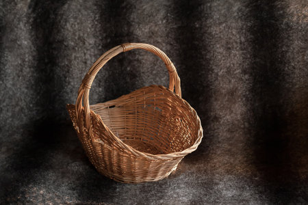 Empty basket on dark backgroundの写真素材