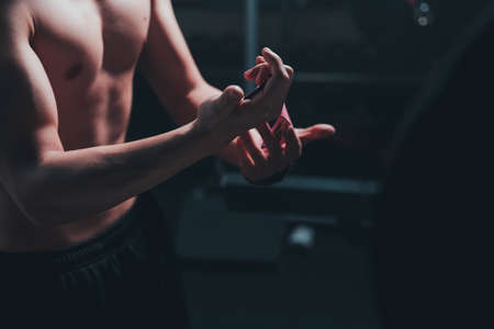 Man doing squat in the gymの写真素材