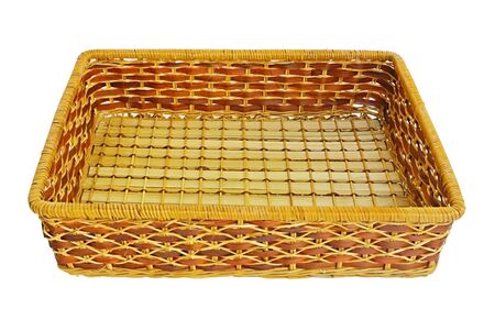 Empty wicker basket isolated on whiteの写真素材
