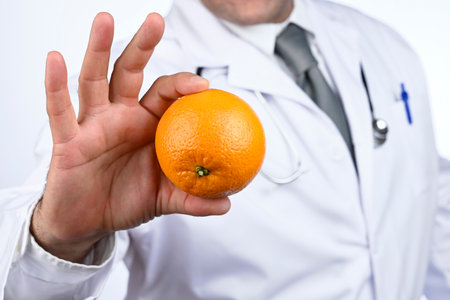 Health concept. Nutritionist doctor advises us to eat fruit. Healthy diet.の写真素材