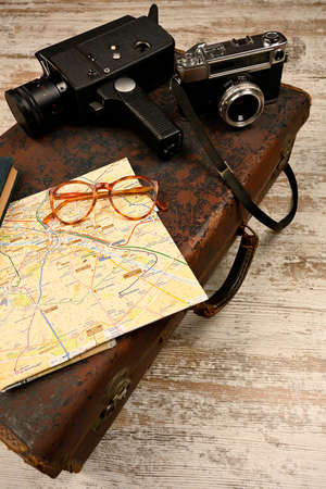 Ready vacation suitcase, with retro cameras, holiday concept, place for text, top viewの写真素材