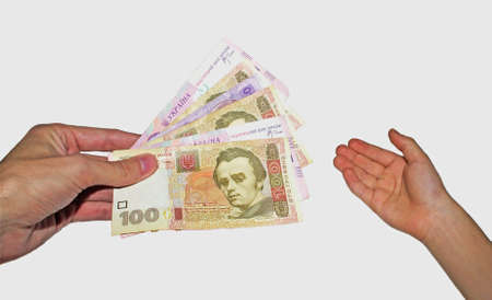 Money in hand on white background isolated