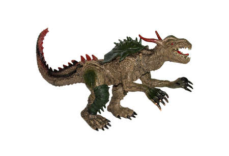 A toy dinosaur on a white background isolated .の写真素材