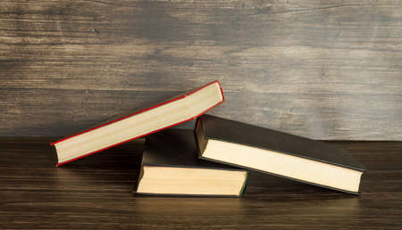 Books on a wooden backgroundの写真素材