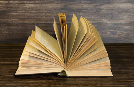 Book on a wooden backgroundの写真素材