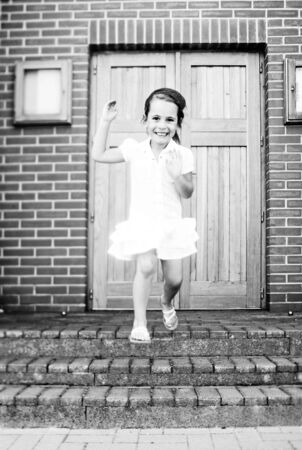 little girl jumpingの写真素材