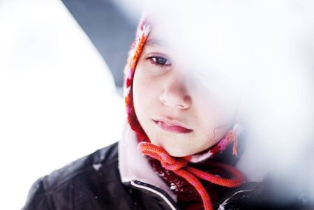 little girl with umbrellaの写真素材