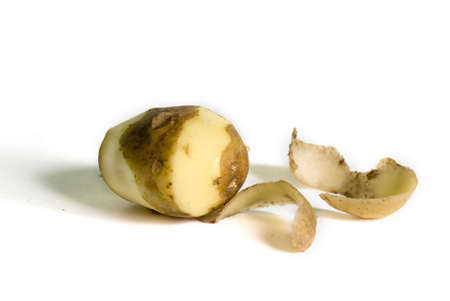 One patato half without his skinの写真素材
