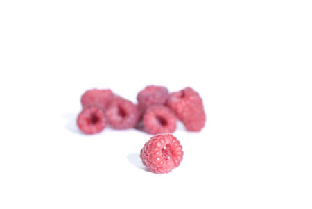 One isolated lonely raspberryの写真素材