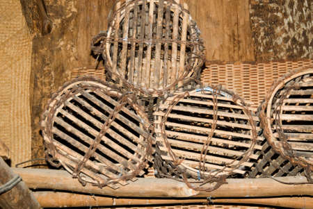 four old round baskets in an old houseの写真素材