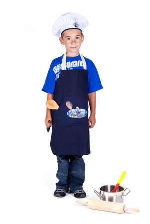 a cooking boy, isolated on whiteの写真素材