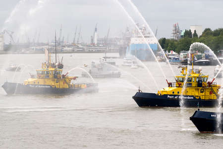 Fire Fighting Boat sprays jets of waterの写真素材