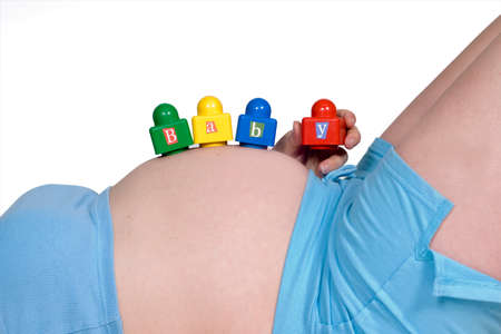  sign on pregnant bellyの写真素材