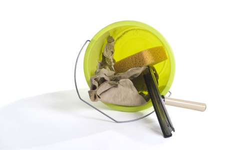 a green bucket with window-cleaning stuffの写真素材