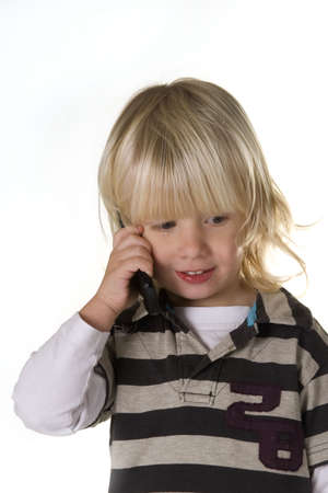 A young boy is calling his dadの写真素材
