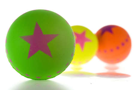 three rubber balls, isolated on a white backgroundの写真素材