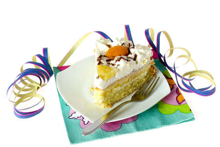 a piece of a birthdaycake with decoration for celebrating a birthdayの写真素材