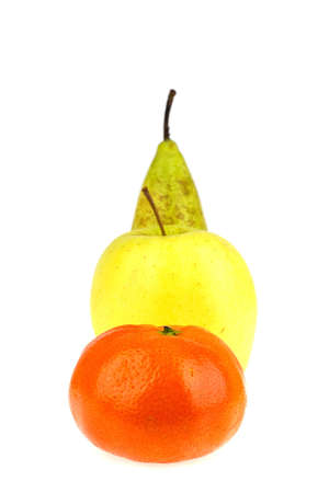 an apple, a pear and a mandarin in a rowの写真素材