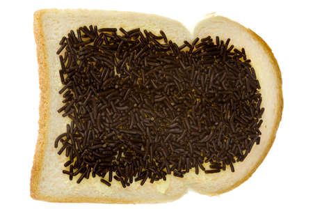 a slice of bread and butter and sprinklesの写真素材