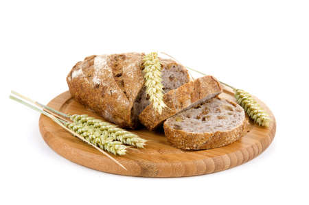nut bread and grain on a cutting board grainの写真素材