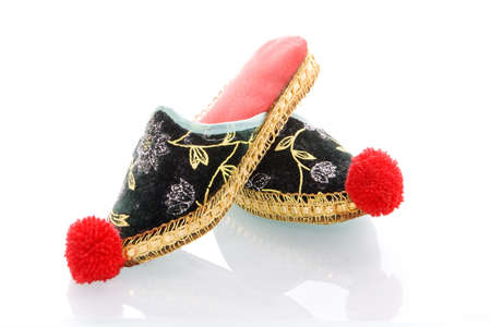 a pair of slippers on a white backgroundの写真素材