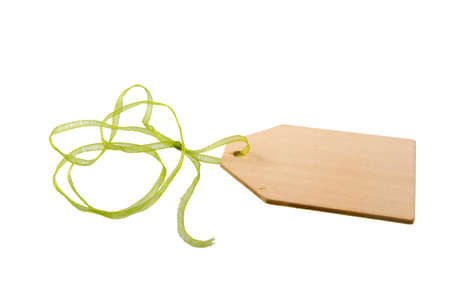 a wooden label with a green ribbonの写真素材