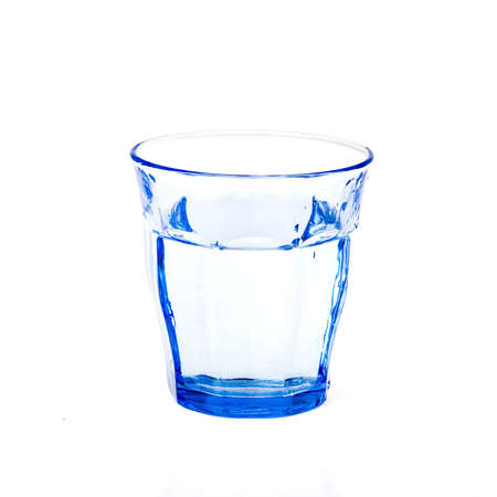 a blue glass on a white backgroundの写真素材